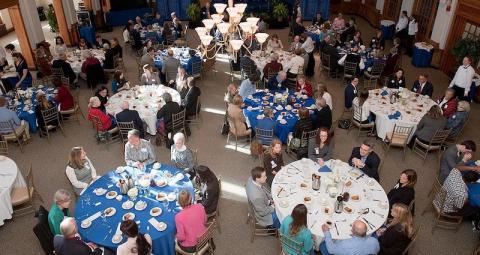 People gathered for an event at Huddleston Hall